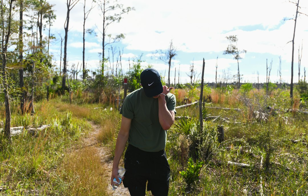 People exploring South Florida grassland and wetland habitat