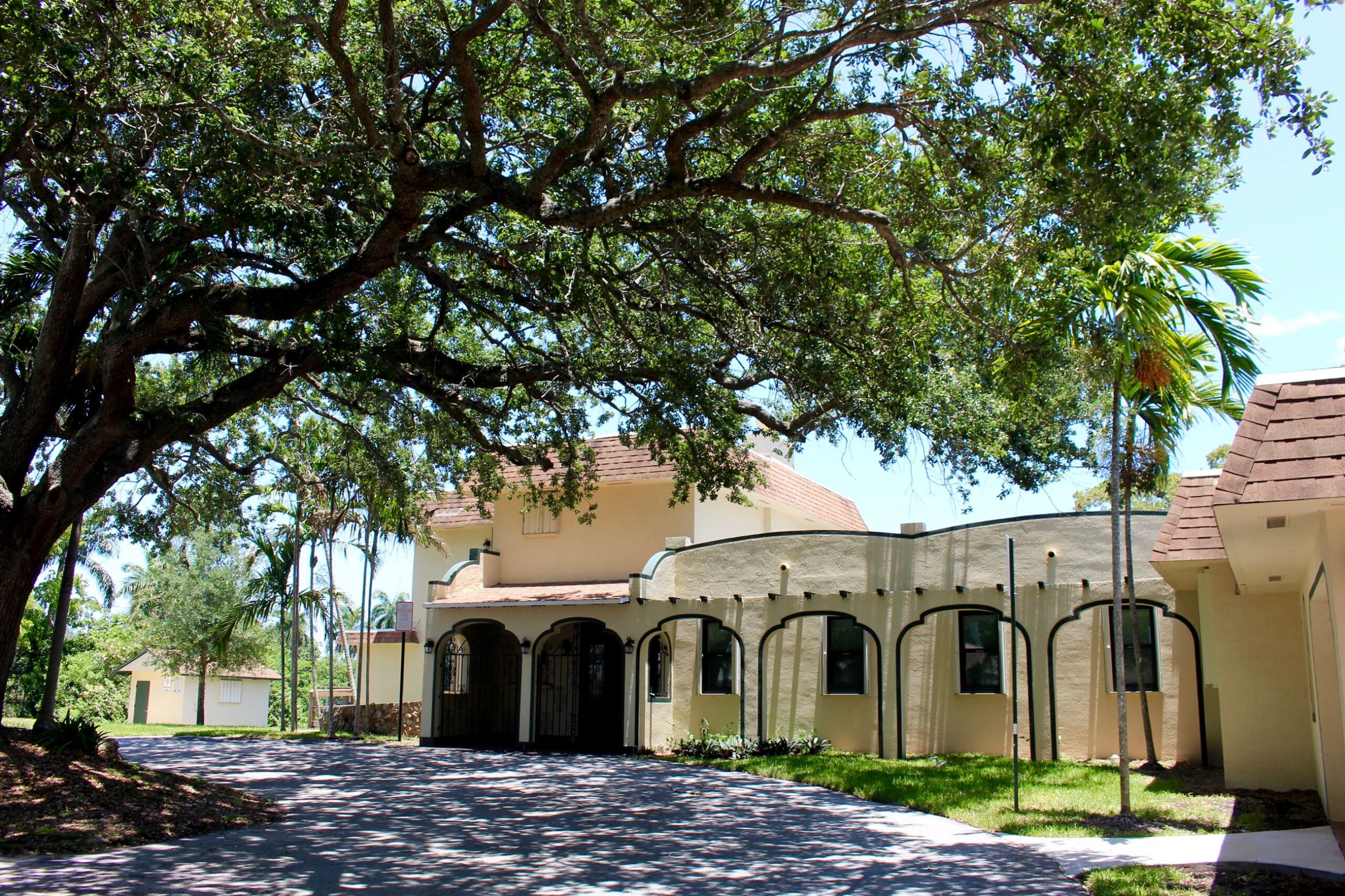 Exterior of the community building at Sunny Lake Bird Sanctuary in Davie, Florida.